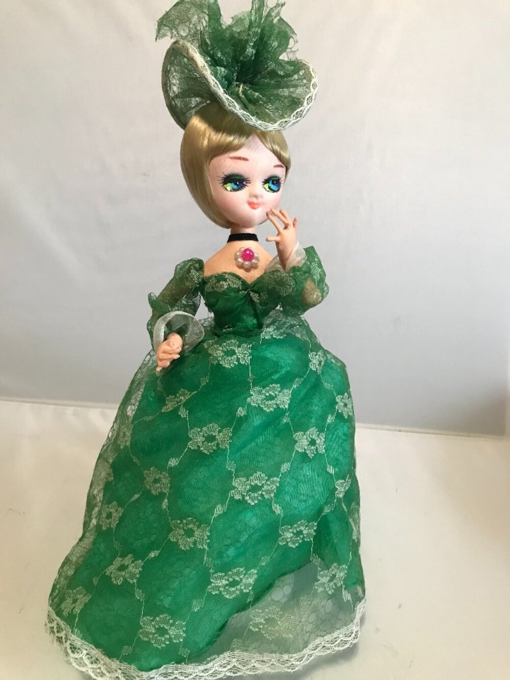 Big Eye Doll Green - Great Vintage Condition on pedestal Blond Hair